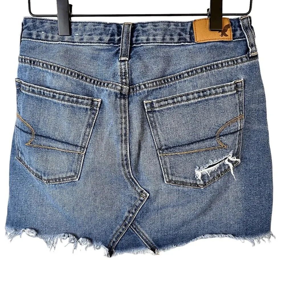 American Eagle Womens Skirt 0 Medium Wash Denim Button Fly Distressed Frayed Hem